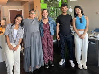 Bilingual production team collaborating across borders